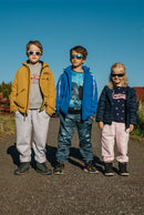 DĚTSKÉ JOGGERY (ROBIN) - KVĚTY / zlatý obrys Vz. 1 / AKVARELOVÝ MRAMOR - Sada šití